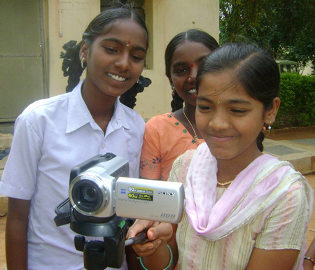 Youth working with cameras